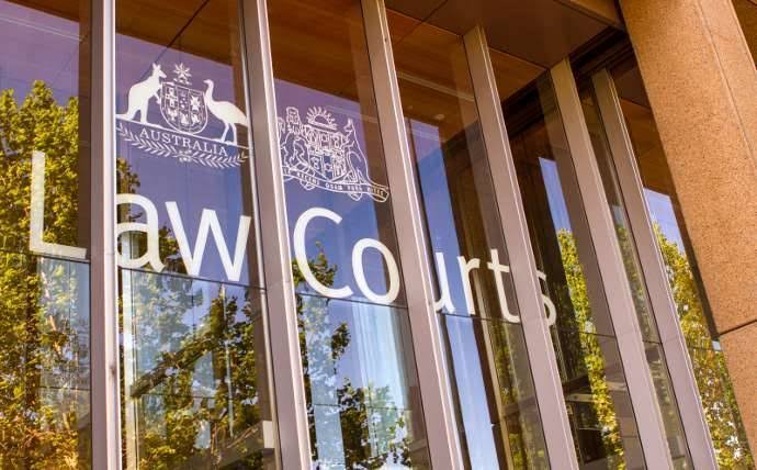 Australian Law Courts building entrance with coat of arms, representing the modernization of legal AI tools in Australia's justice system